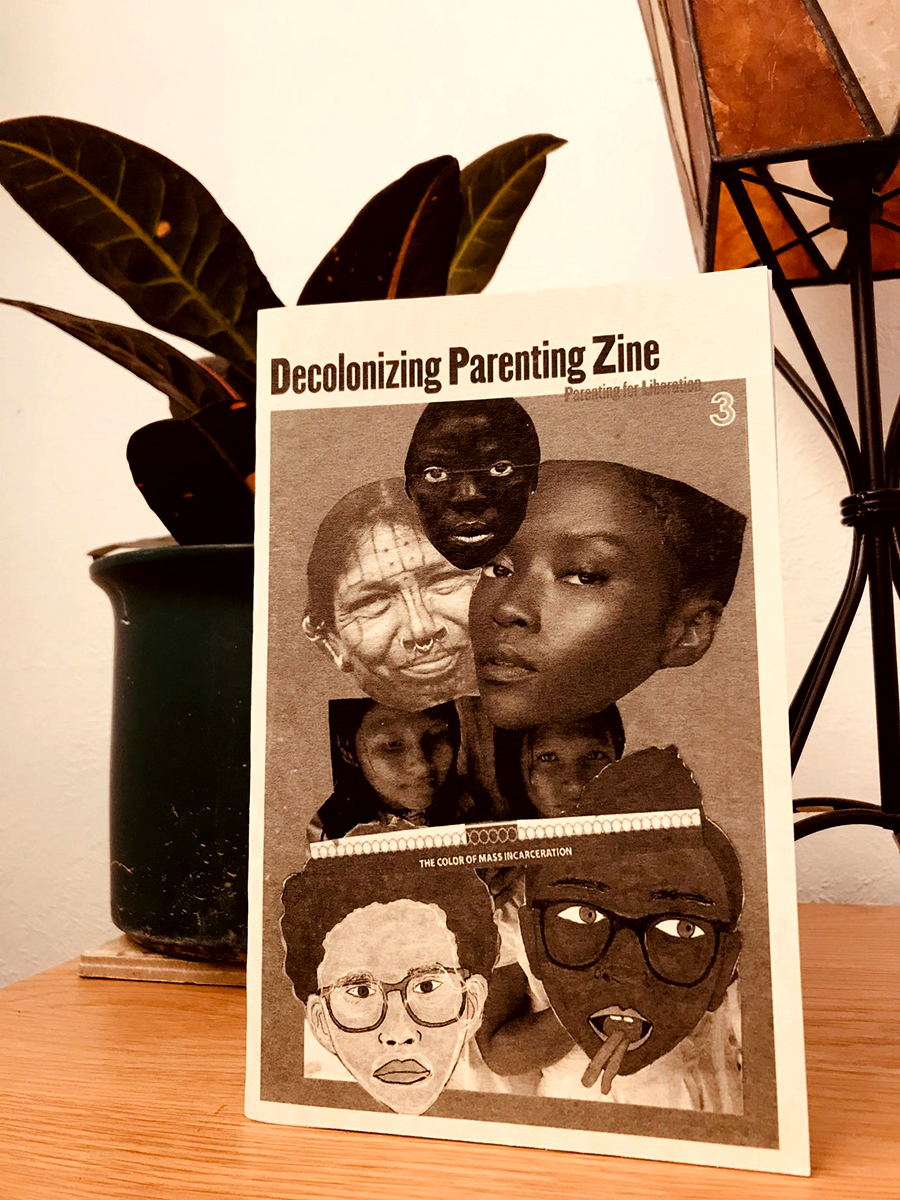 photo of zine cover: Black family collage. Zine standing by a planter.